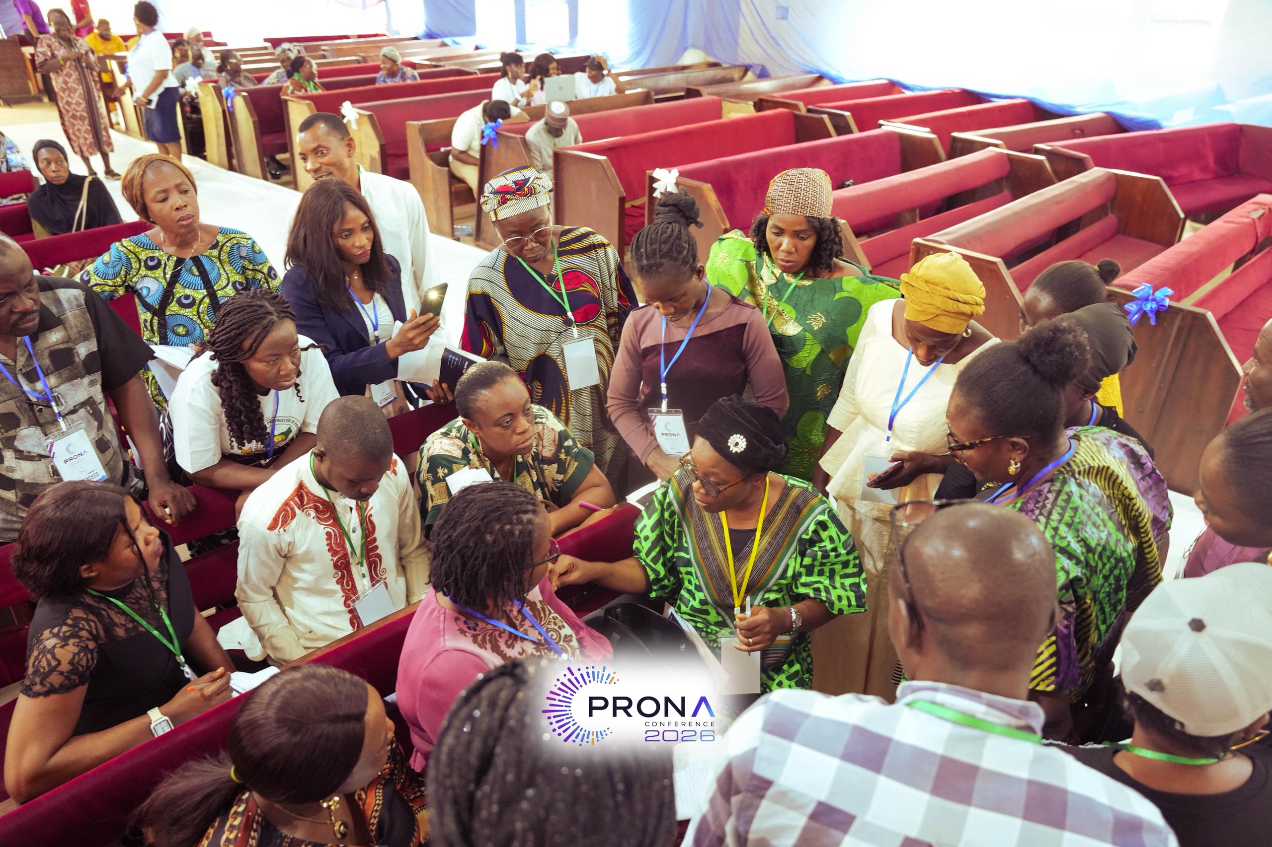 Attendees gathered around a bench during PRONA