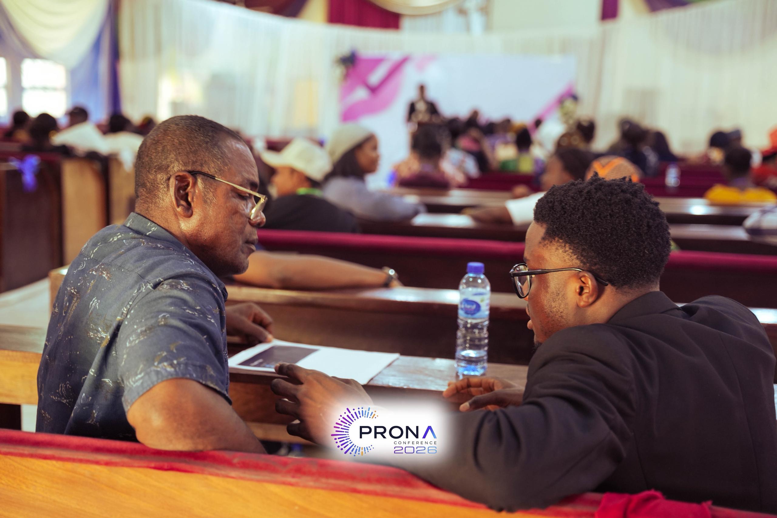 Dada Iyanuoluwa in conversation with a proprietor
